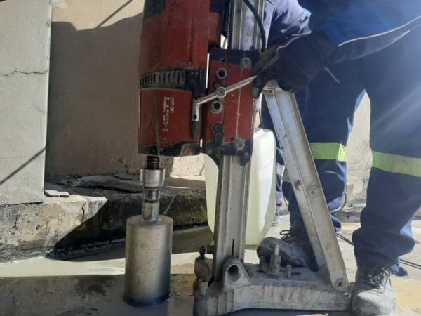 Vus Core Drilling Equipment Core drilling machine in use for construction.