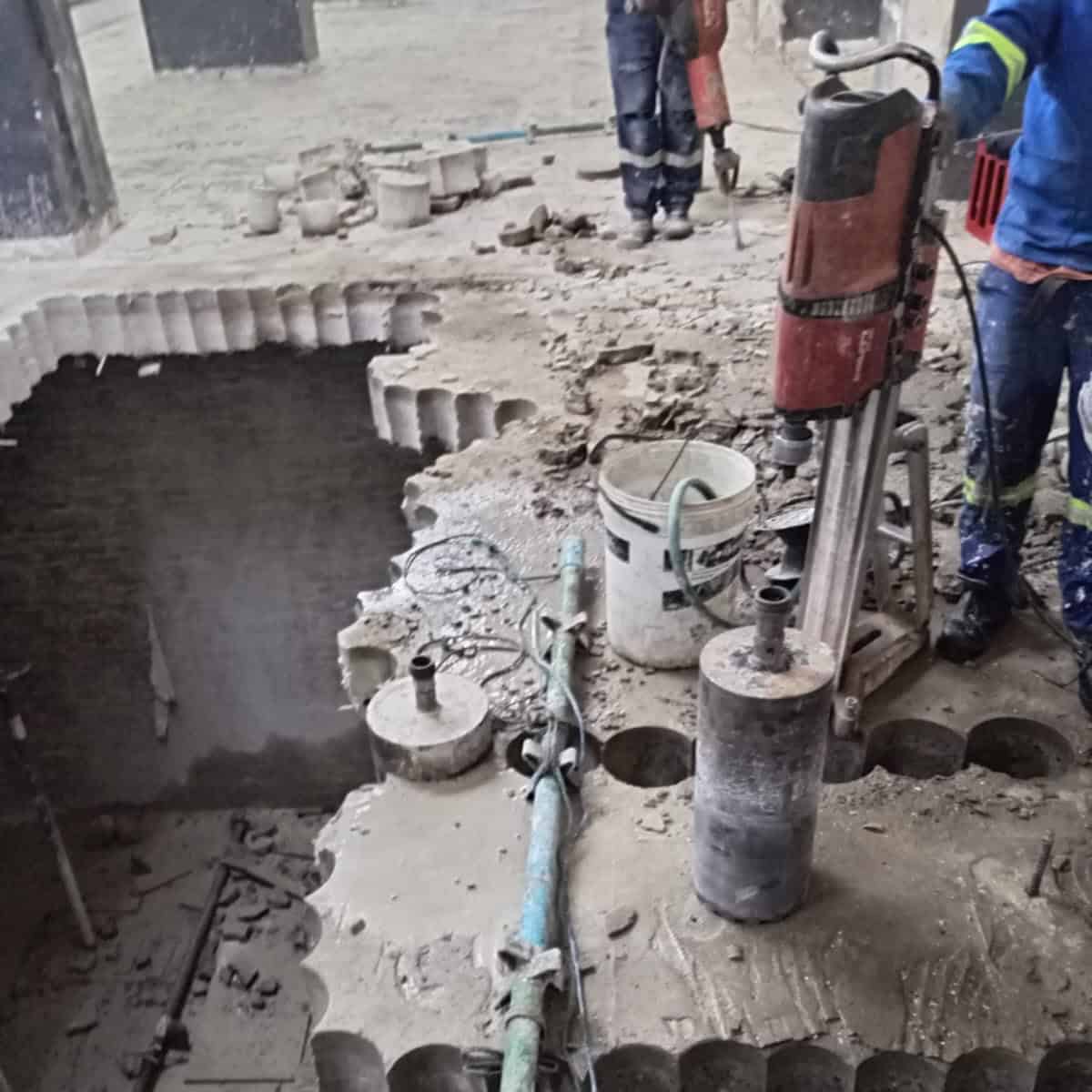 VUS Core Drilling team using Hilti DD350 stitch drilling through a 250mm solid reinforced concrete slab, Central Johannesburg