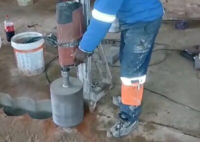 Vus Core Drilling operator using a core drill rig on site at Diplomat Hotel, Johannesburg CBD